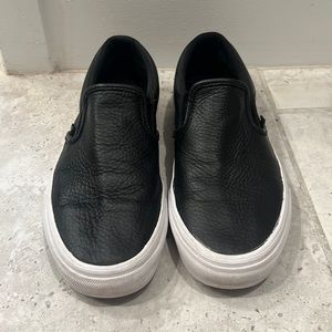 Vans black leather slip ones